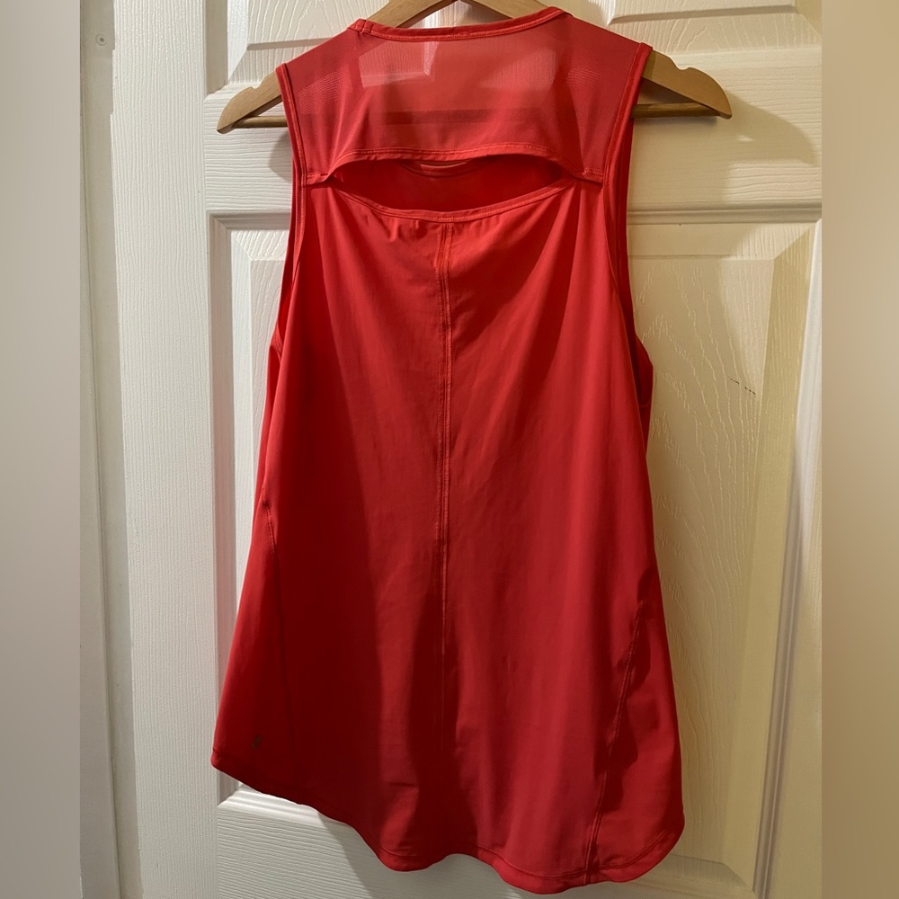 Lululemon 8 or 10 coral tank back cutout mesh perfect condition.